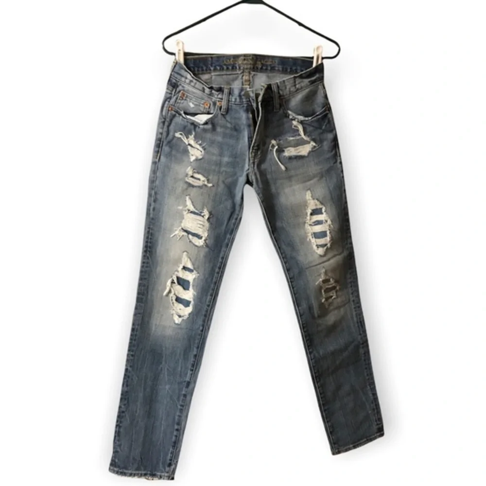 American Eagle Jeans Mens Slim Straight Size 28 X 34 Blue Ripped Thrashed